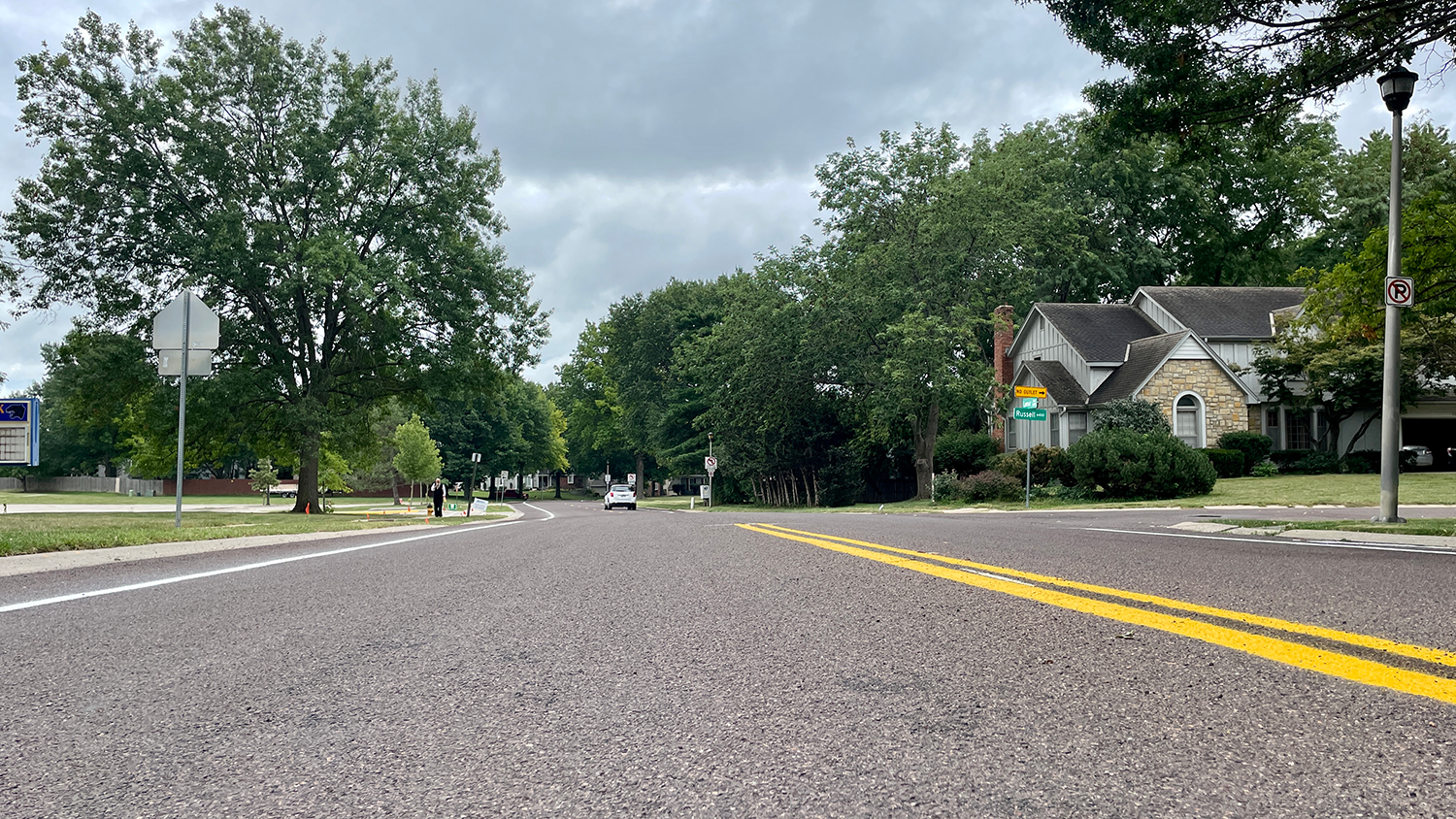 Photo of repaved streets near a residential area.